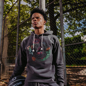 Basketball player Anderson "Shift" Diaz wearing the Overtime Hooping is Paradise hoodie