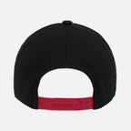 Black cap with a red snapback