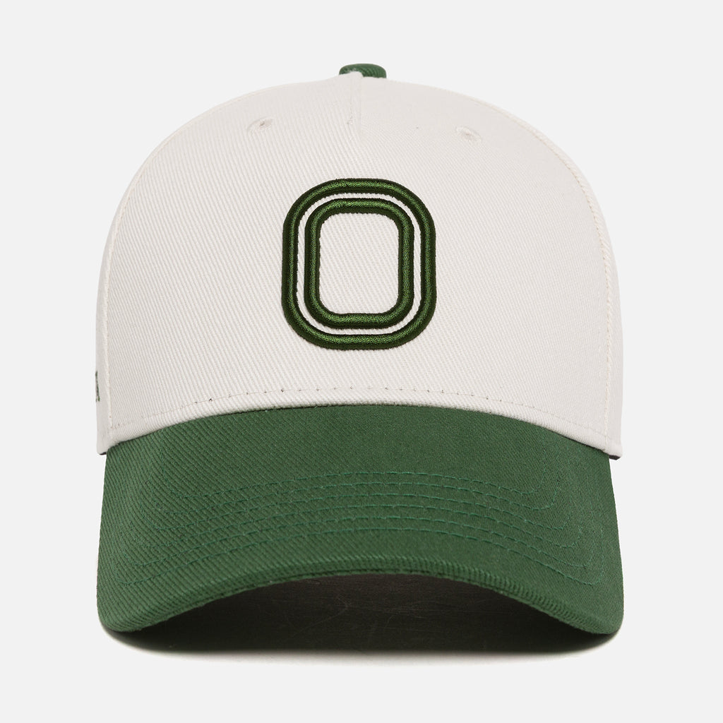 White and green cap with a "O" logo