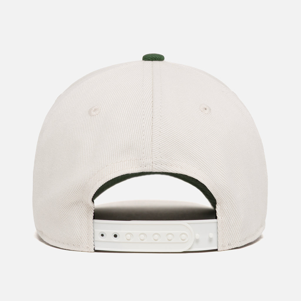 Back view of a white cap with a white snapback