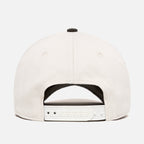 White cap with a white snapback