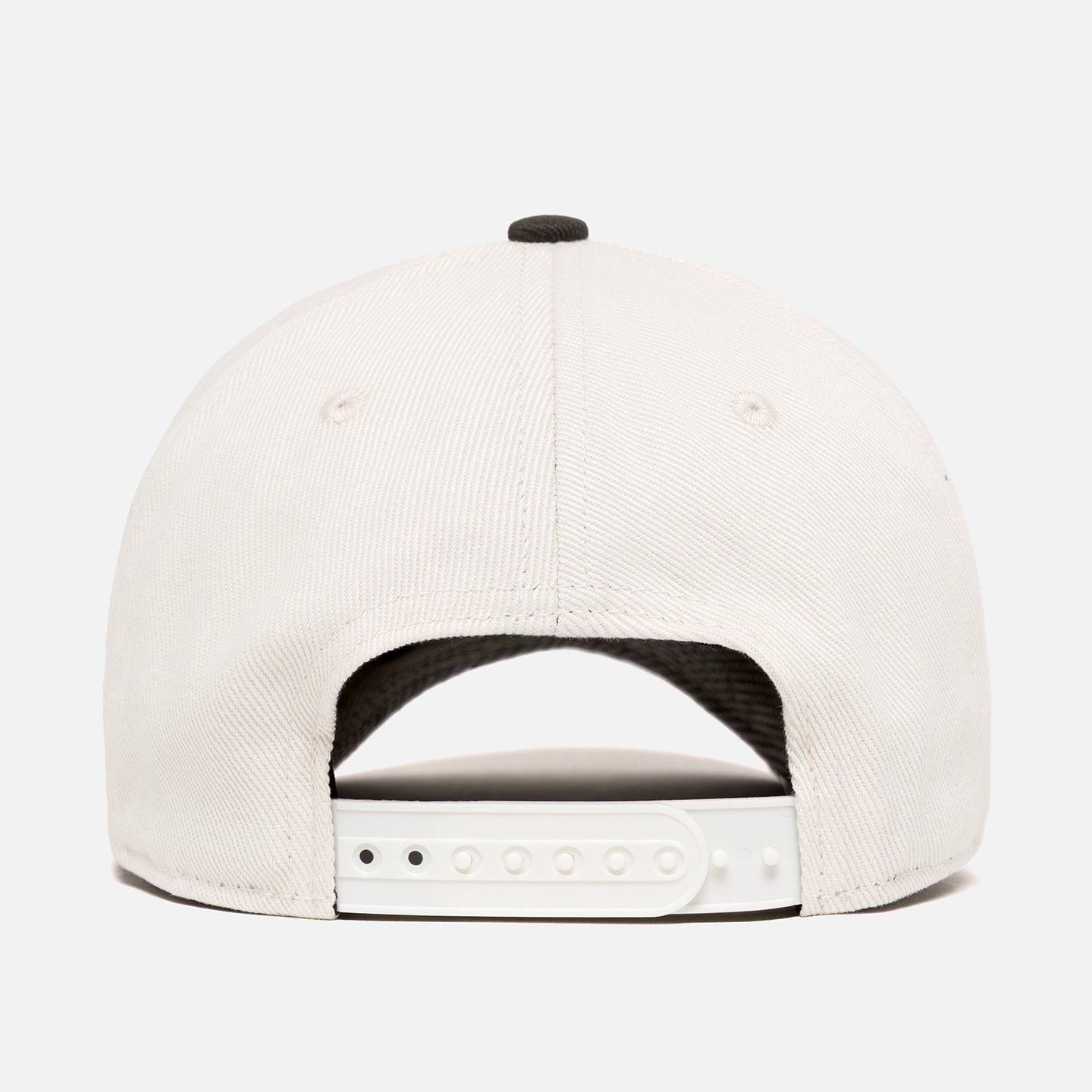 White cap with a white snapback