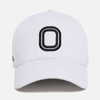White cap with a black "O" logo
