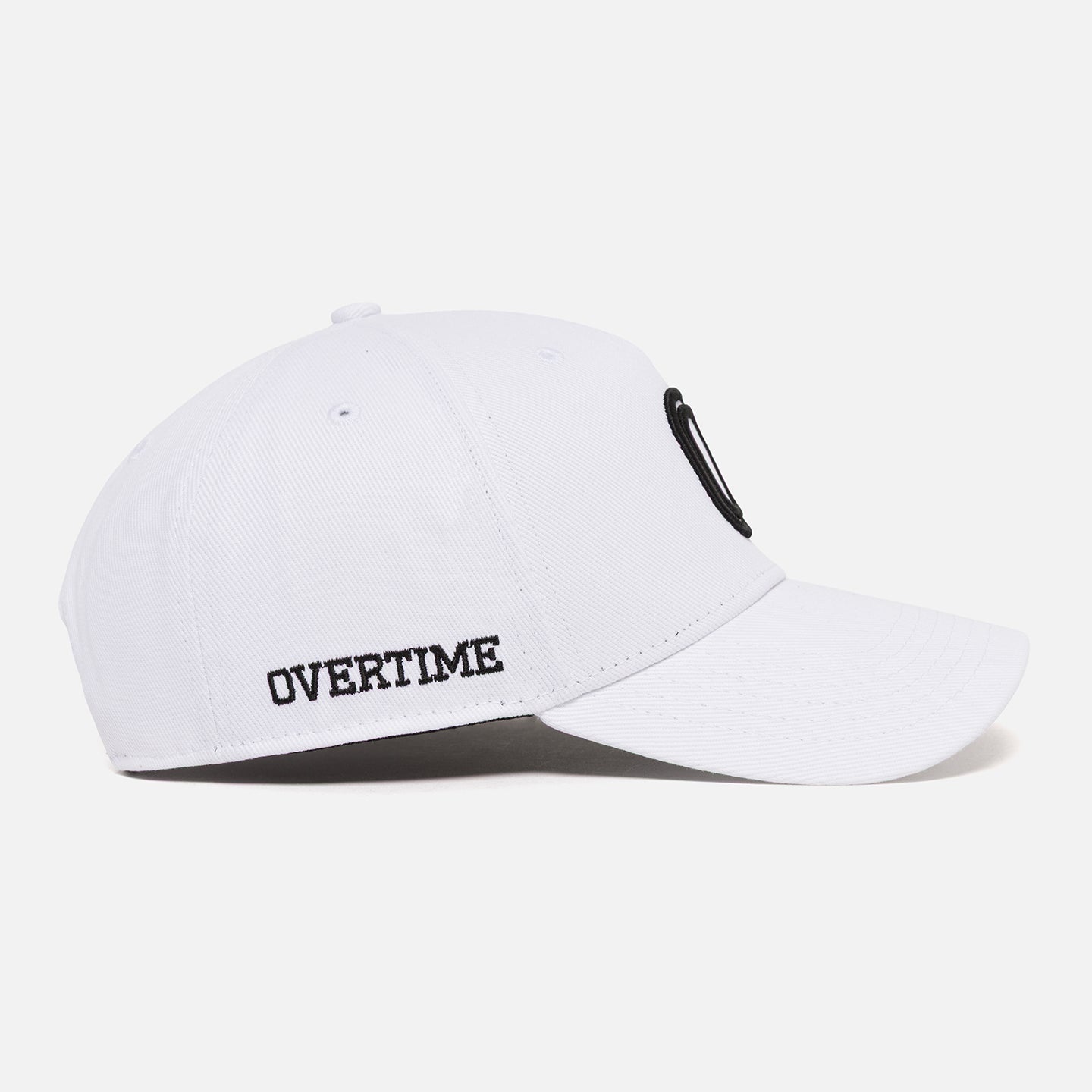 White cap with a black "OVERTIME" logo