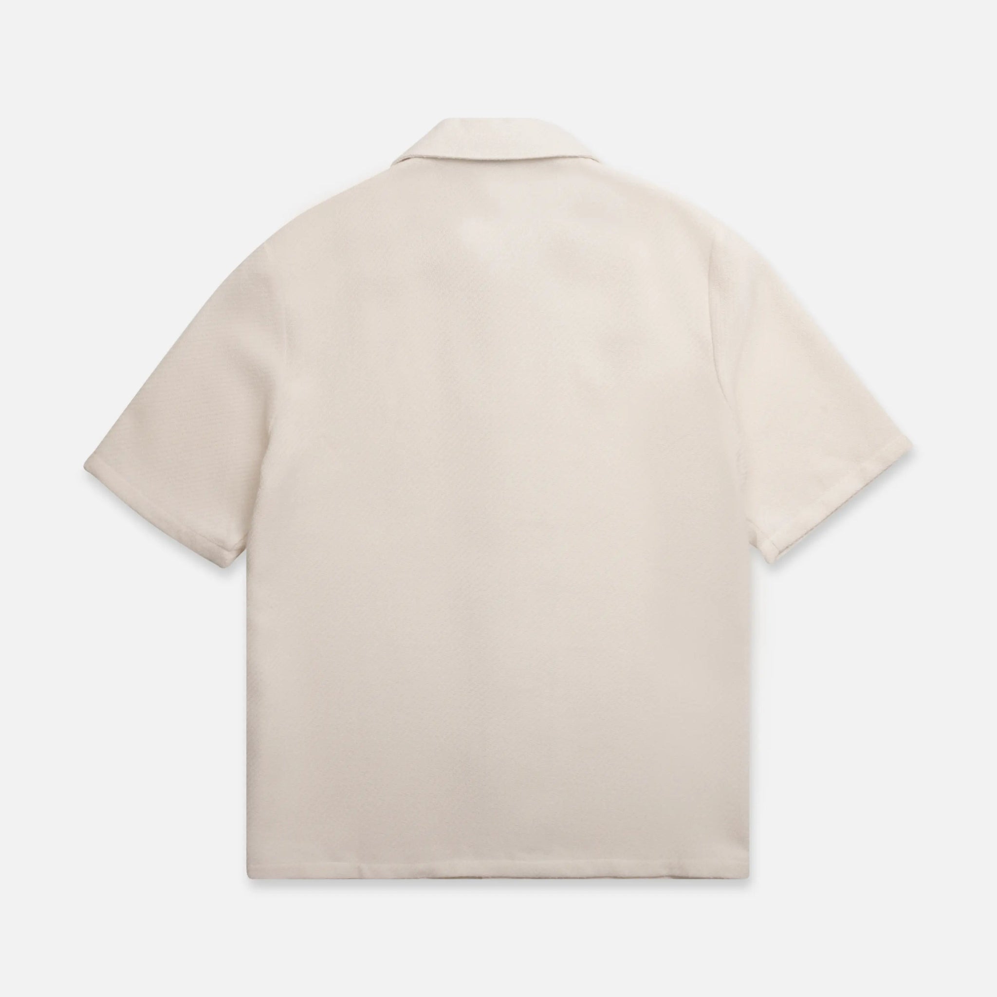 Back of beige short-sleeve collared shirt
