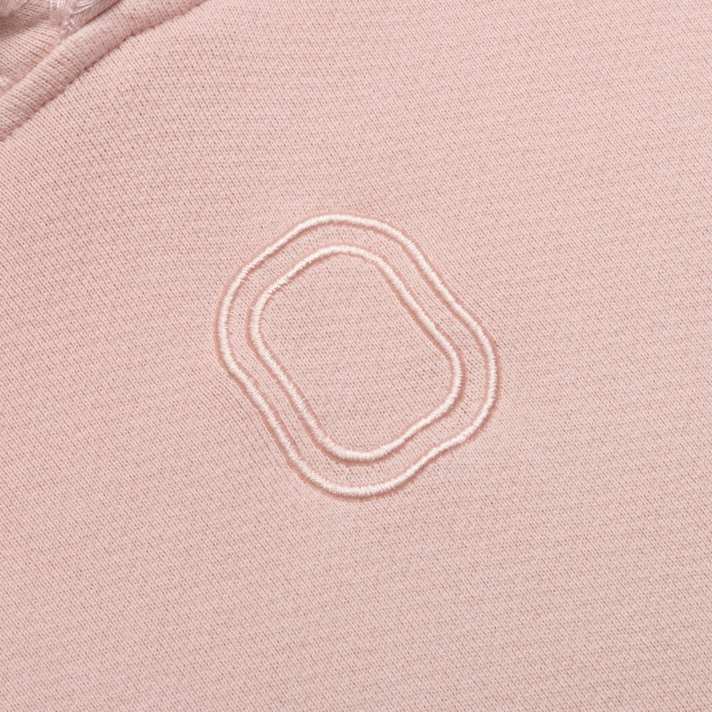Close-up of embroidered "O" logo