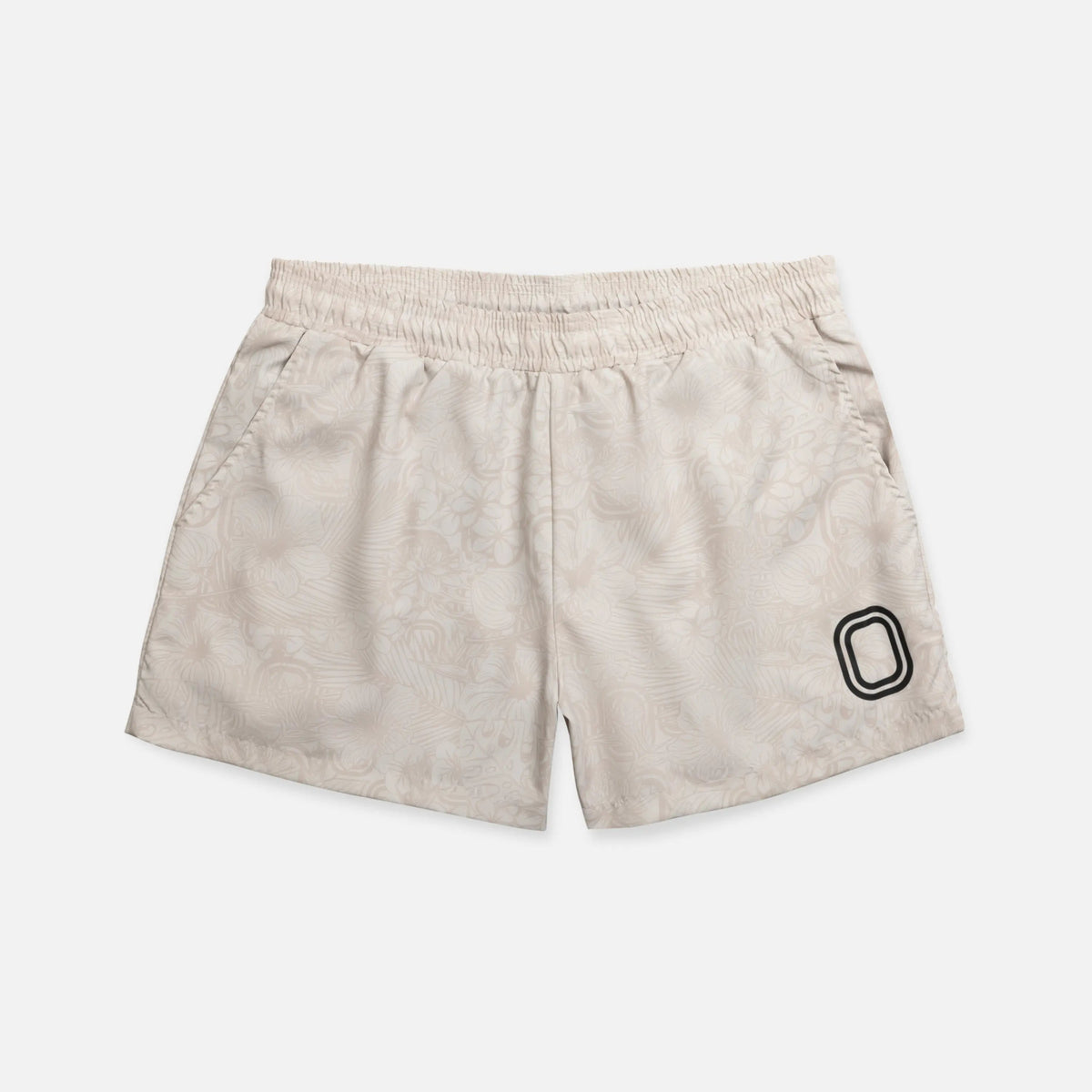 Beige shorts with a black "O"
logo 