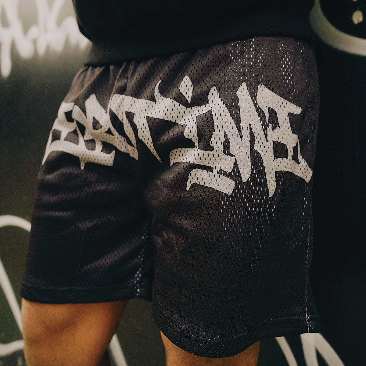 SCRIPT LOGO MESH YELLOW SHORTS