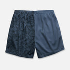 Back of black mesh basketball shorts with a floral pattern