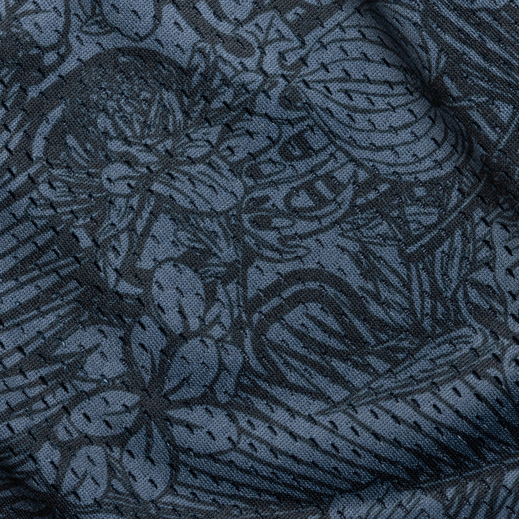 Close-up of mesh basketball shorts with an all over floral print