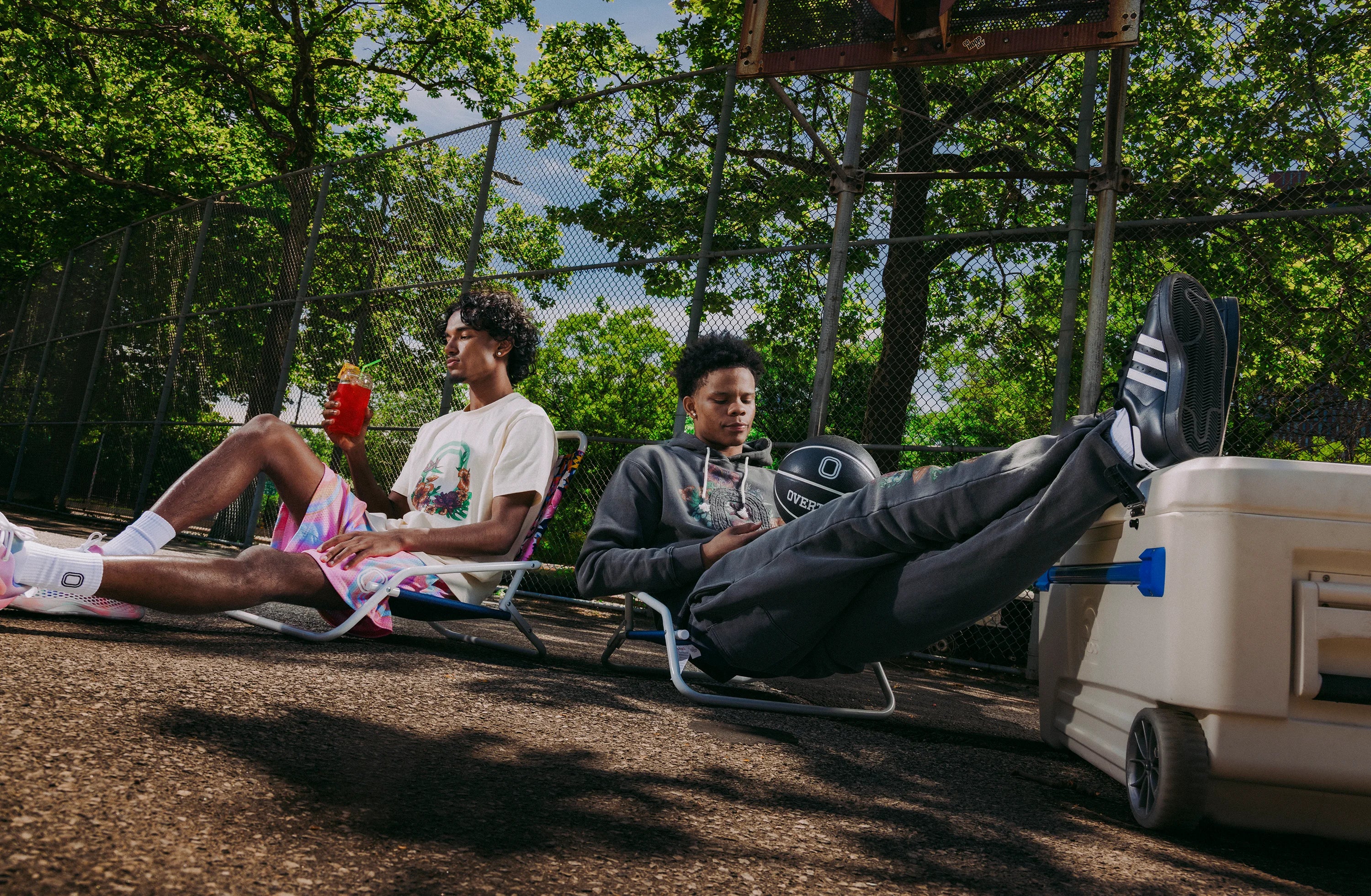 Models wearing Summer Black Bloom Tee and Black Summer Hoodie & Joggers.
