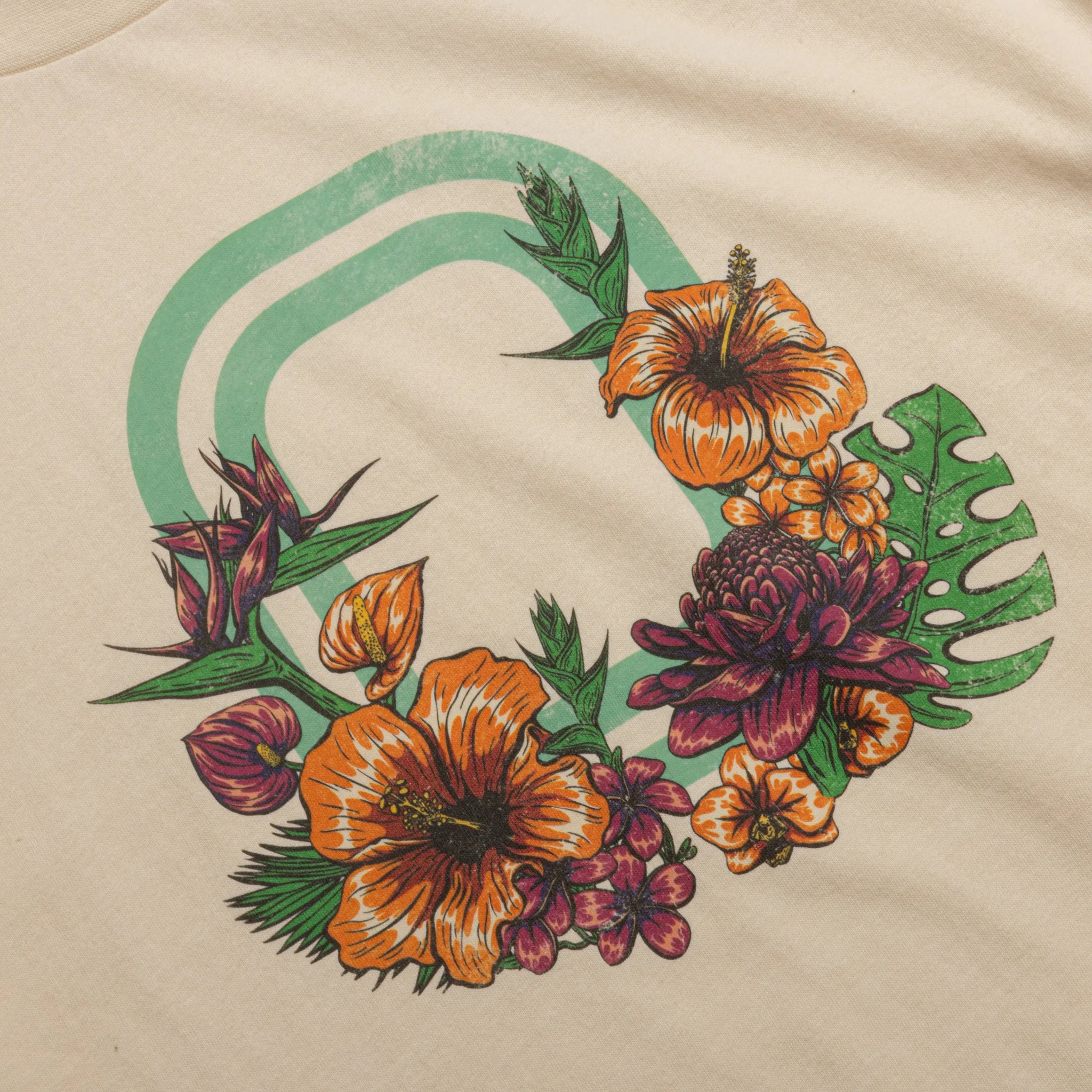 Floral design with flowers and leaves on a beige tee 