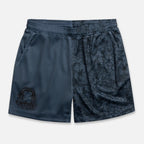 Black athletic shorts with a floral pattern