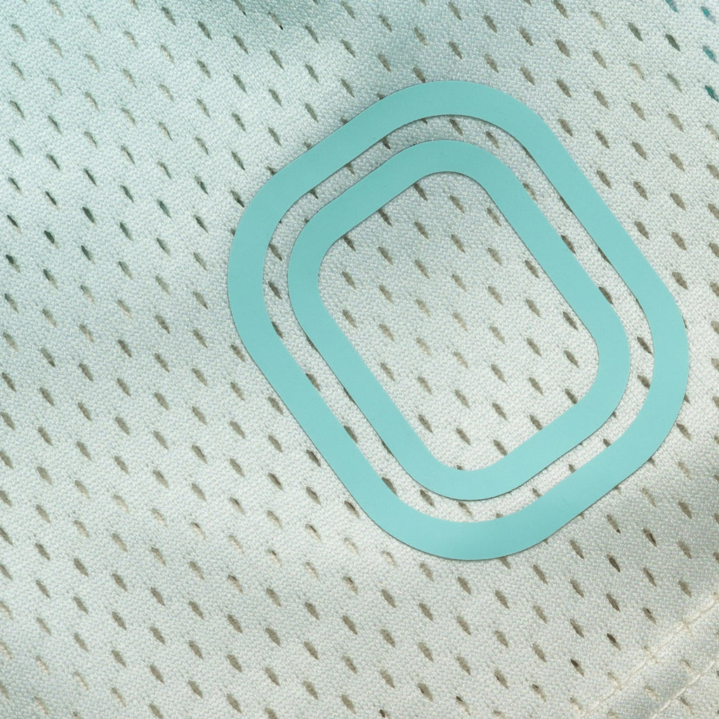 Light blue "O" on basketball shorts