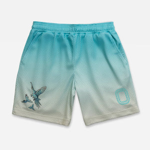 Gradient blue shorts with a bird design