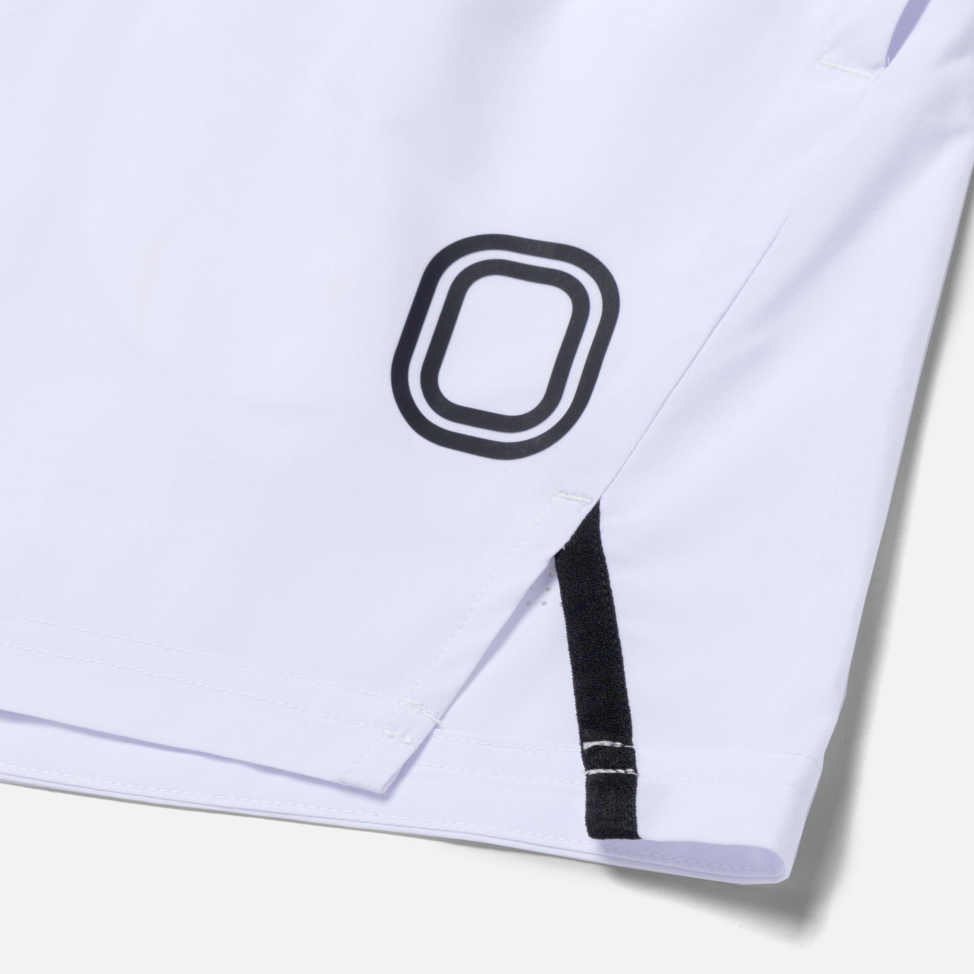 White fabric with black "O" logo