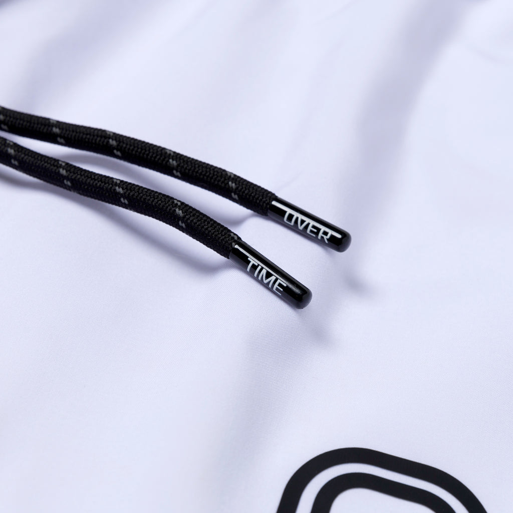 Black drawstrings with "OVERTIME" branding