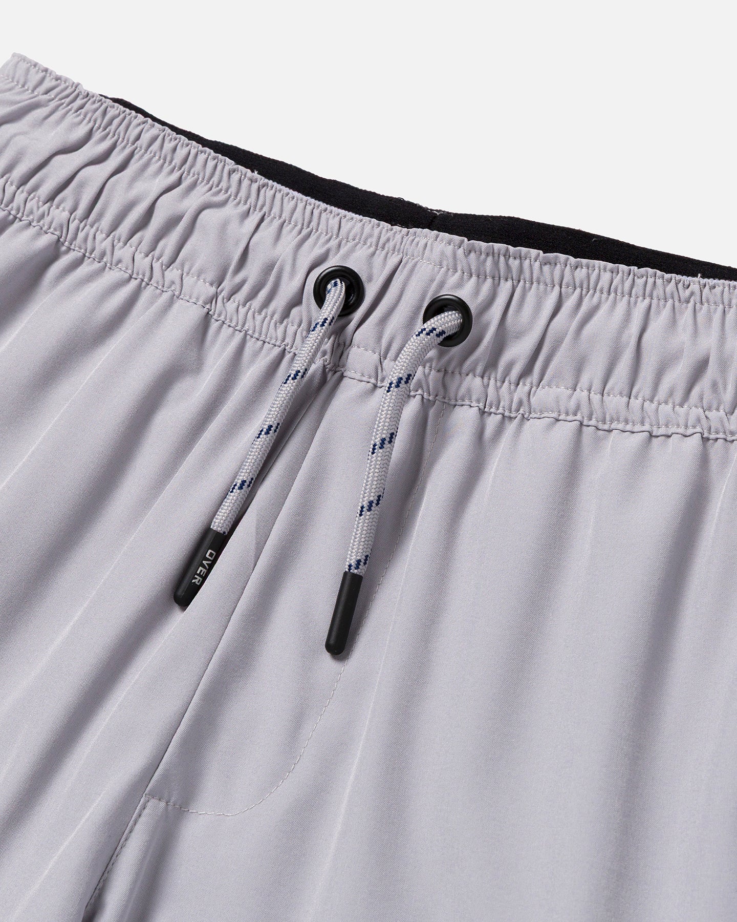 Close-up of gray shorts with drawstrings