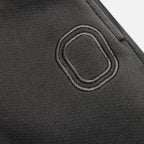 Close-up of an embroidered "O"