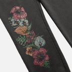 Floral print on black sweatpants