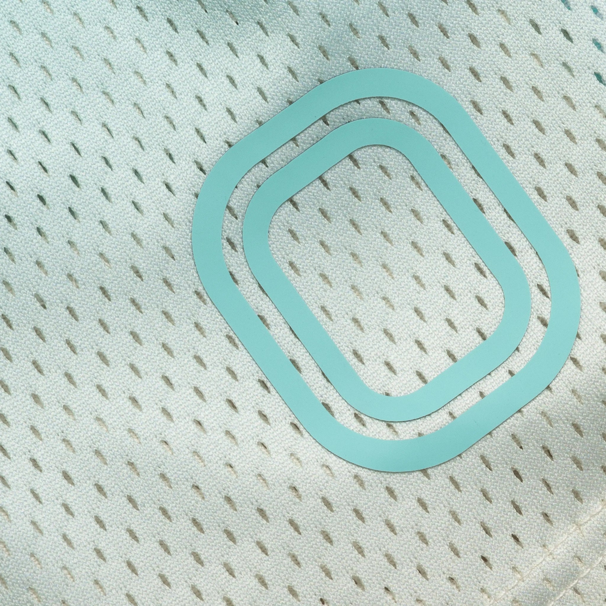 Light blue "O" logo on basketball shorts