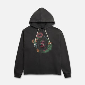 Black hoodie with a colorful floral design , distressed 'O' logo, and raw edge hem