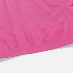 Overtime perforated brand name detail on pink shorts