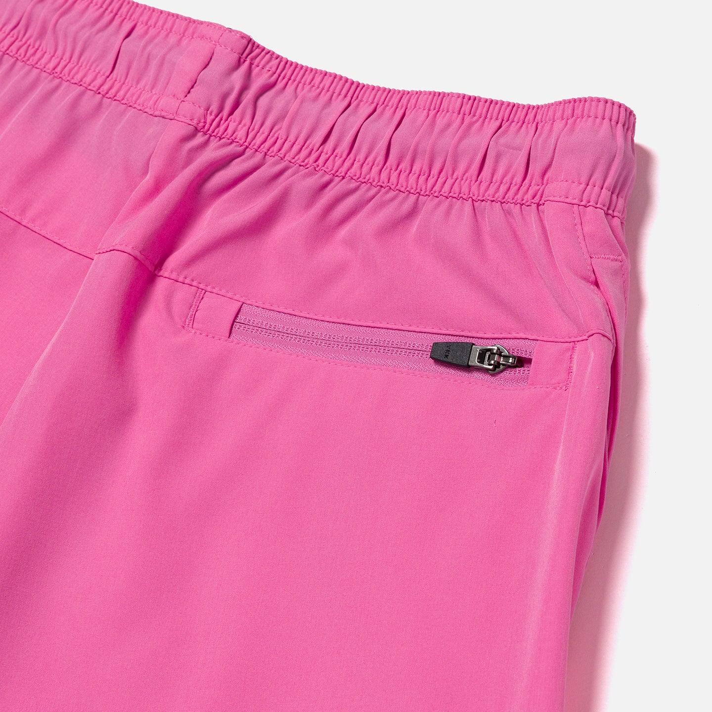 Back of pink shorts with zipper pocket
