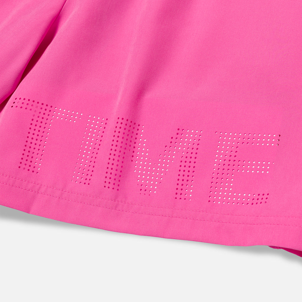 Overtime perforated brand name detail on pink shorts