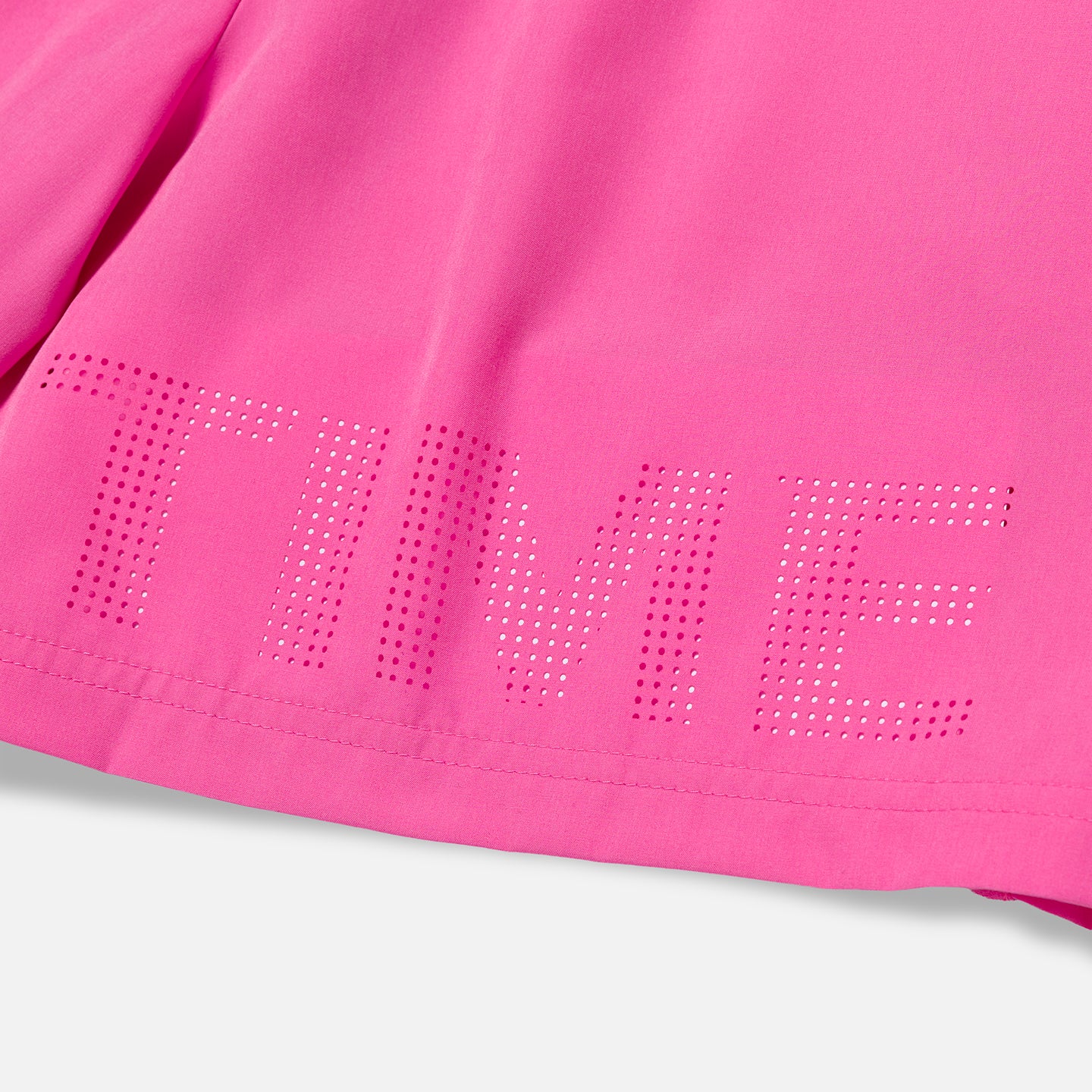 Overtime perforated brand name detail on pink shorts