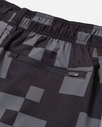 Black and gray checkered shorts with a zipper pocket