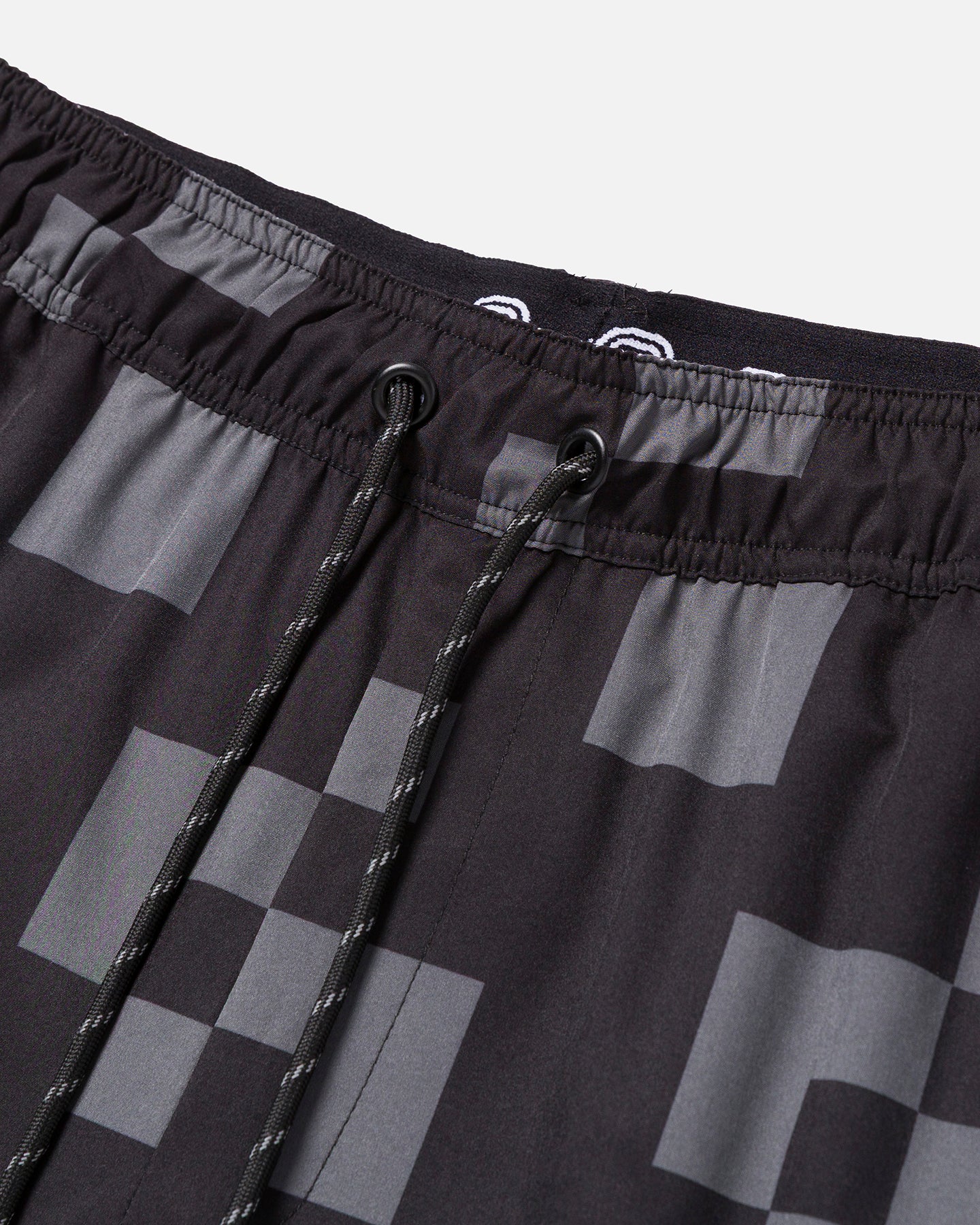 Black and gray checkered shorts with drawstring